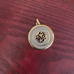 Elegant Gold and Silver Pendant